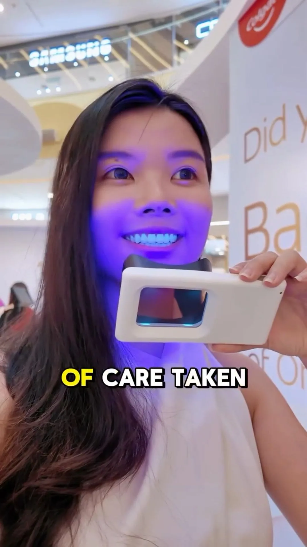 Person under violet illumination during a plaque-light demonstration, image 18
