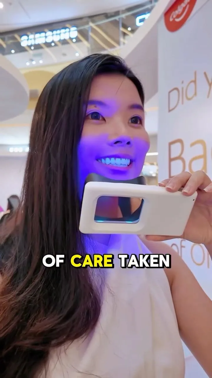Person under violet illumination during a plaque-light demonstration, image 30